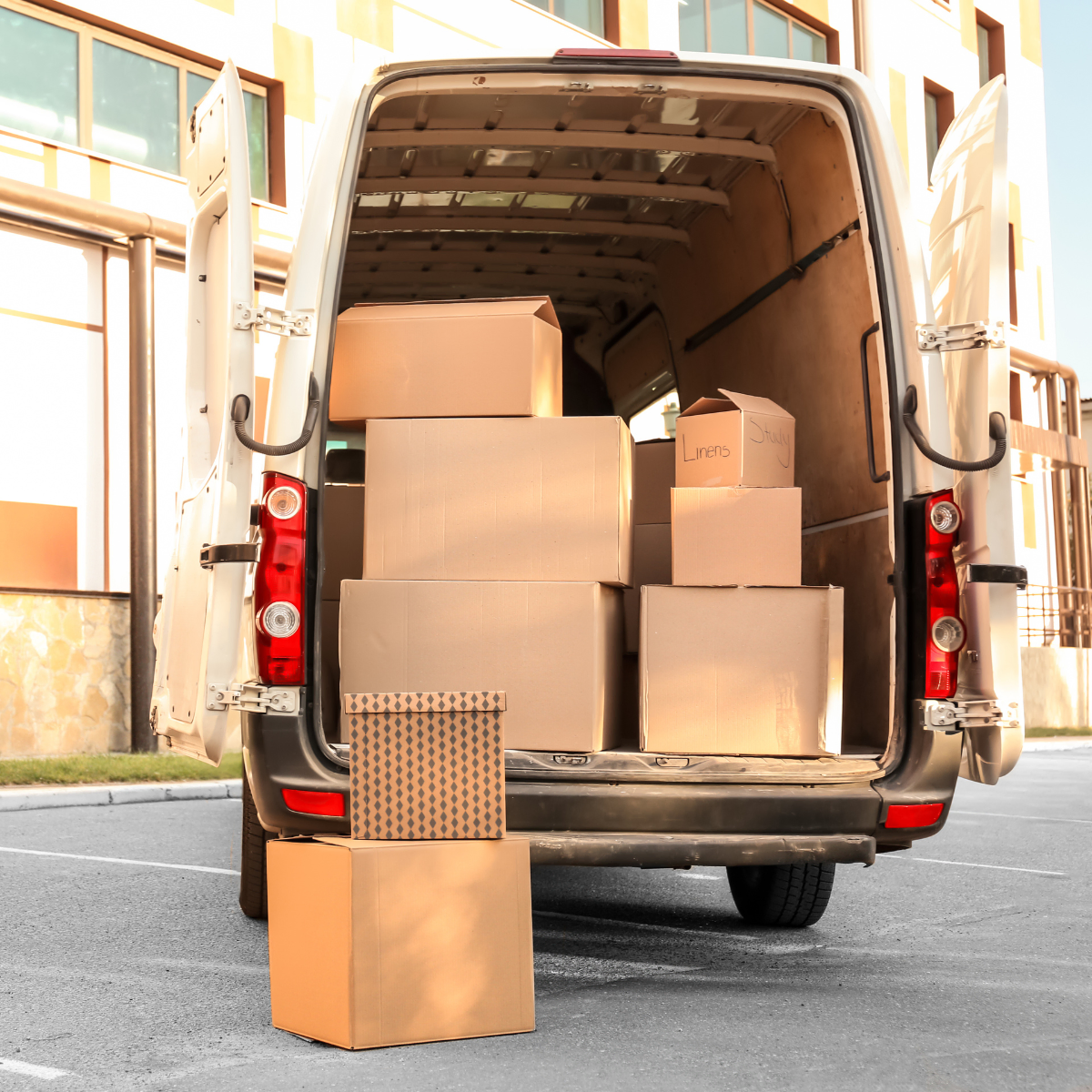 Photo of a moving van filled with boxes containing someone's belongings.
